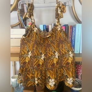 Yellow patterned smock peplum top